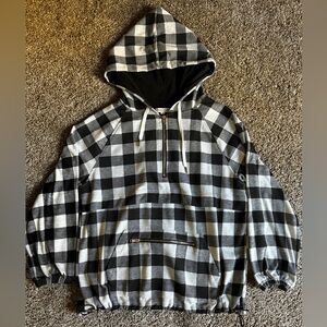 Black and white plaid half zip pullover.